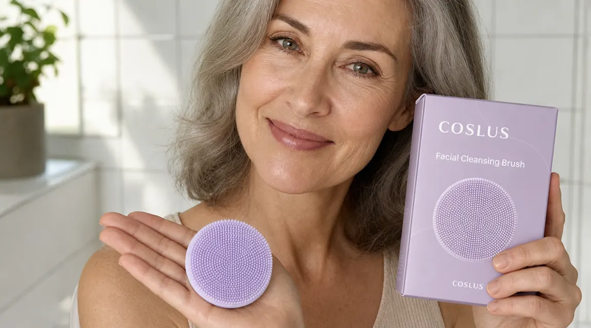 Close-up of COSLUS silicone cleansing brush head showing soft nub texture against a woman's palm